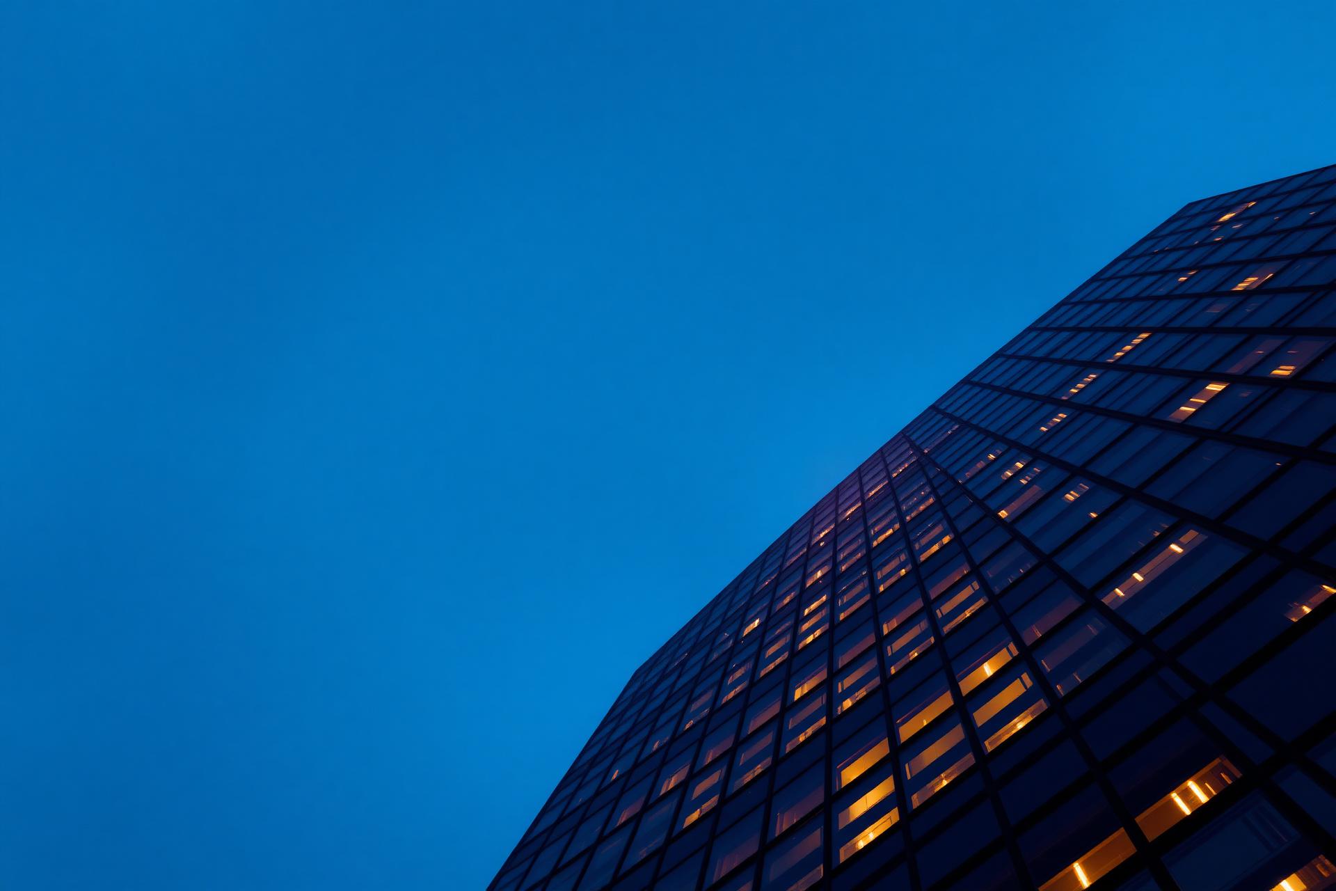 Modern skyscraper facade at dusk